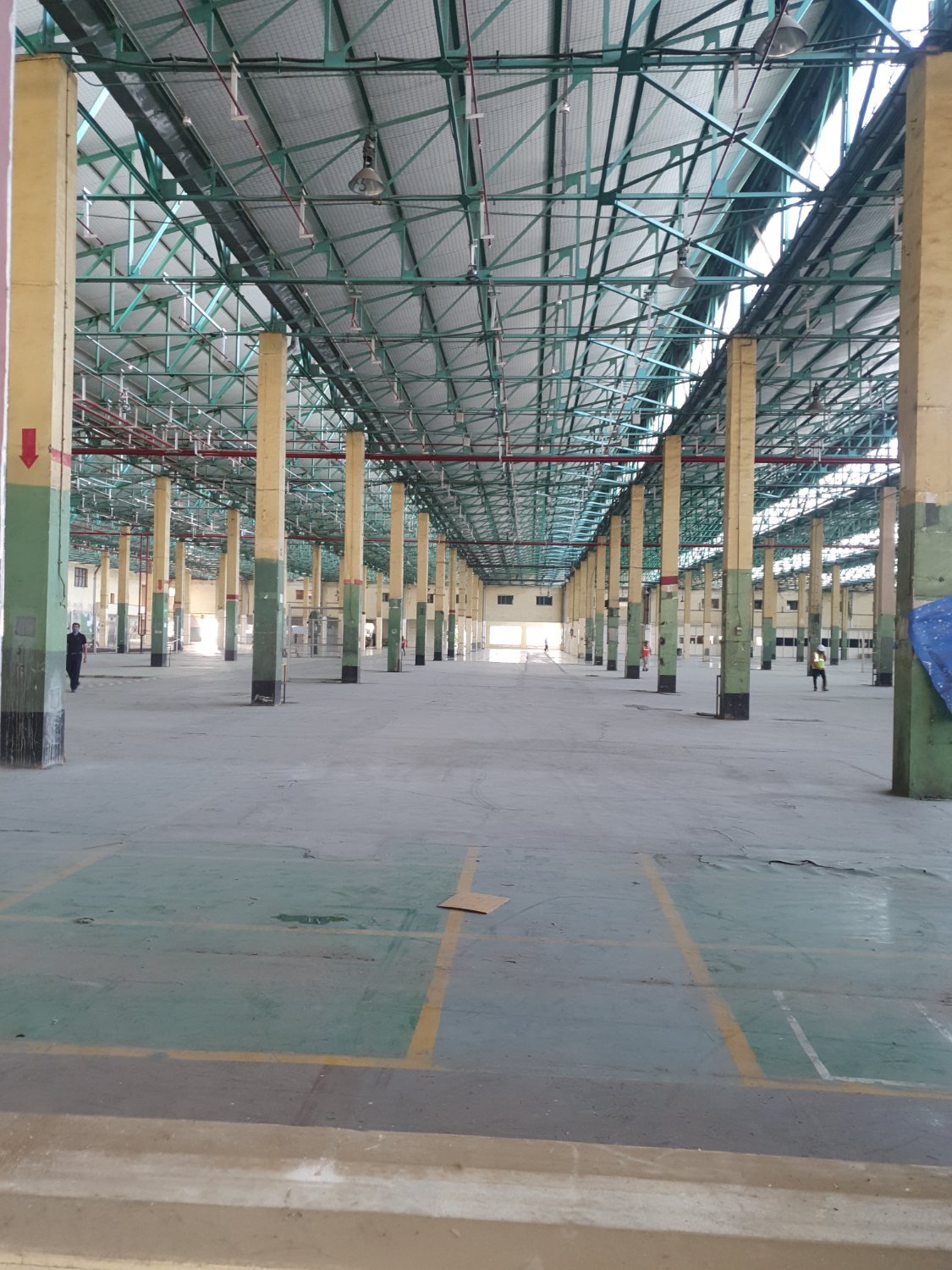 The empty, decades-old factory shed before the EV line was built